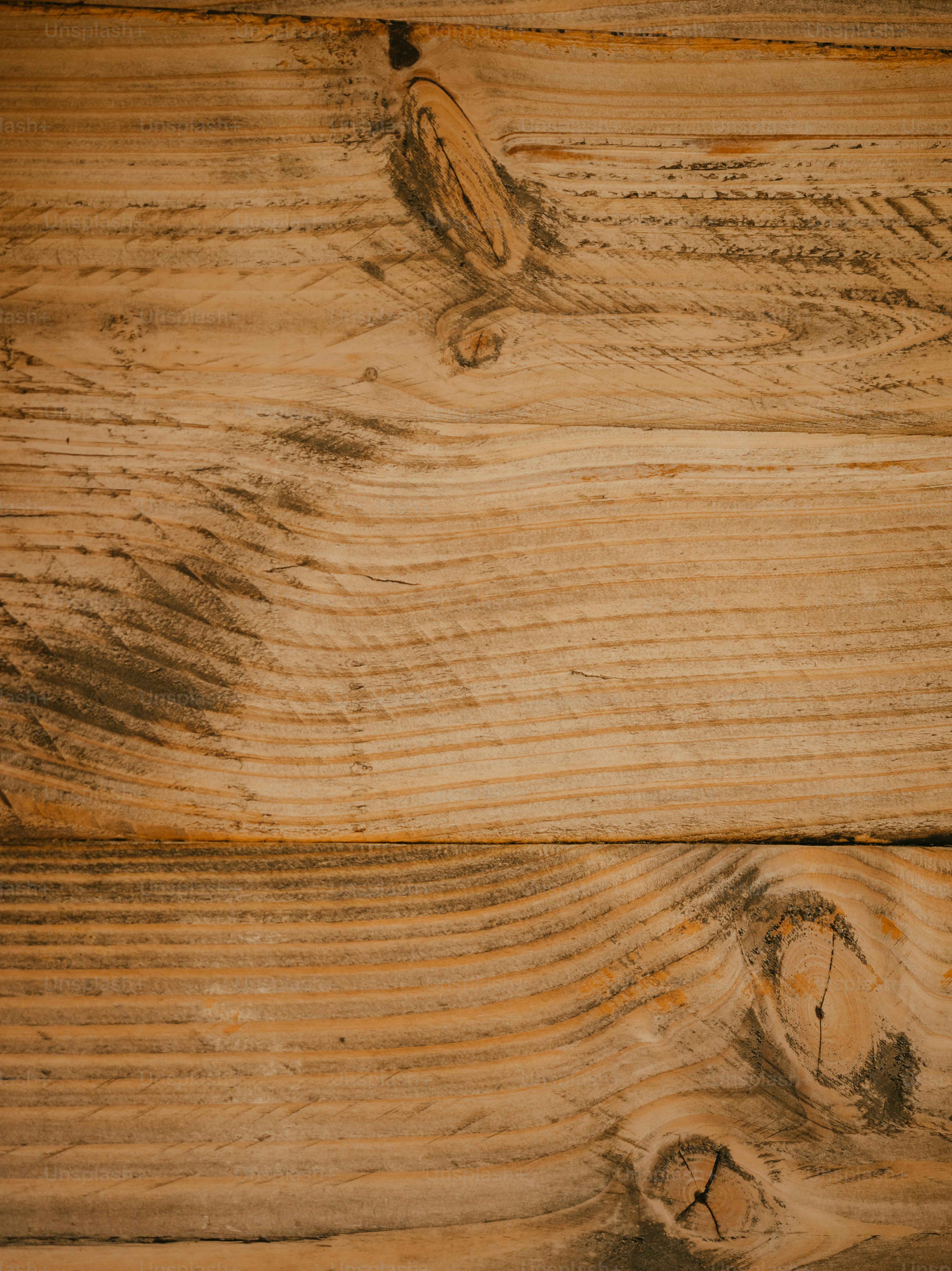 a close up of a piece of wood with a clock on it