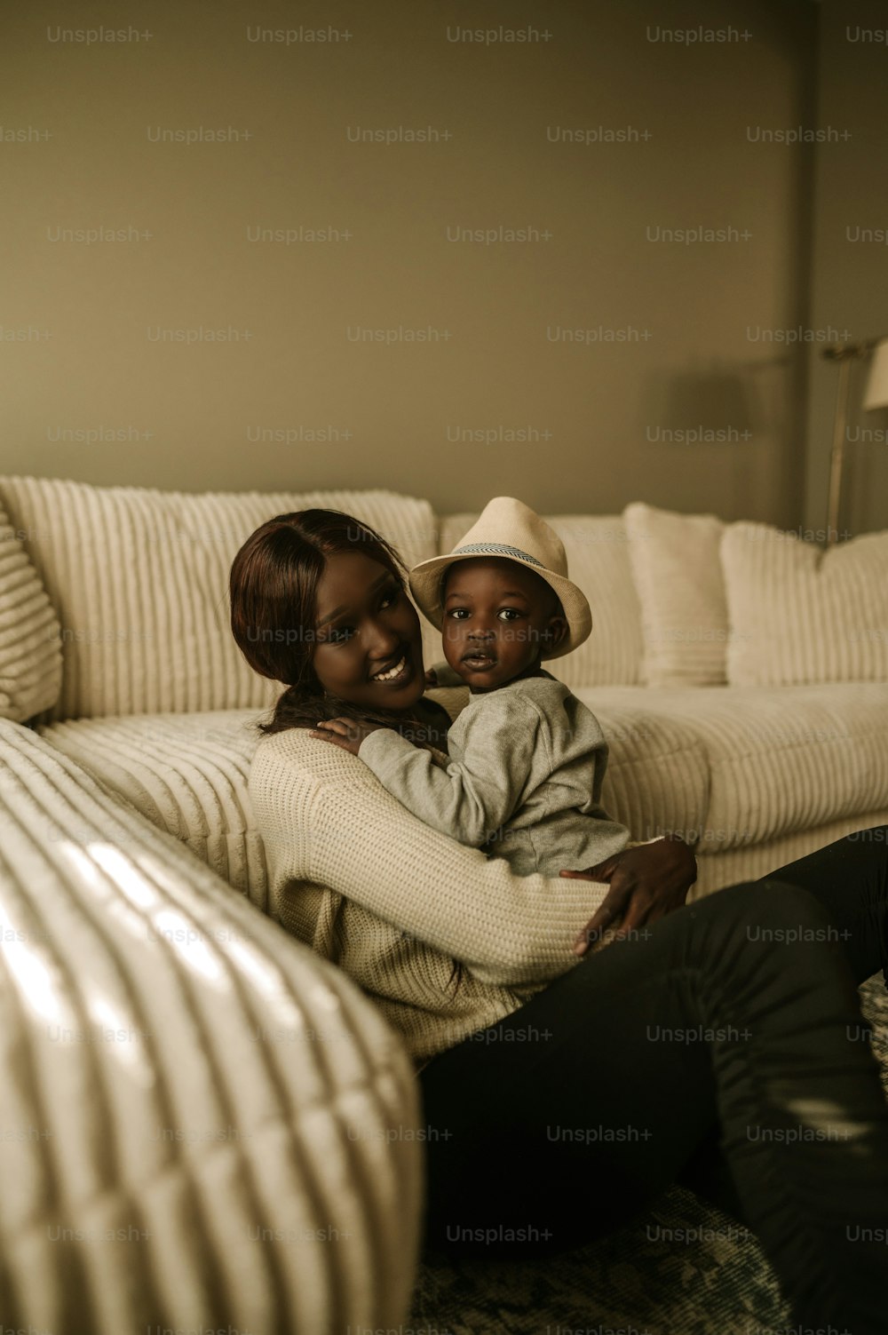 a couple of people that are sitting on a couch