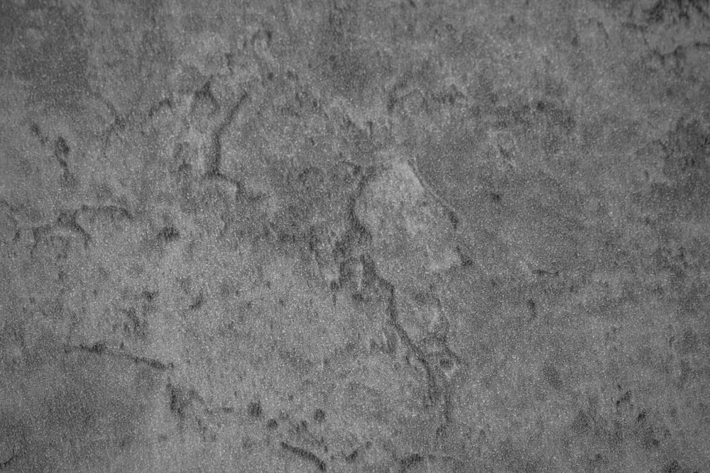 ein Schwarz-Weiß-Foto einer strukturierten Oberfläche