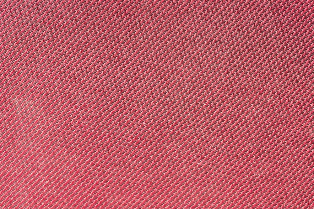 Un primer plano de una textura de tela roja