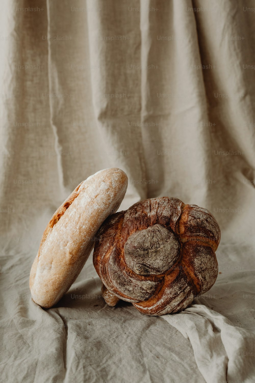 a couple of pieces of bread sitting on top of a table