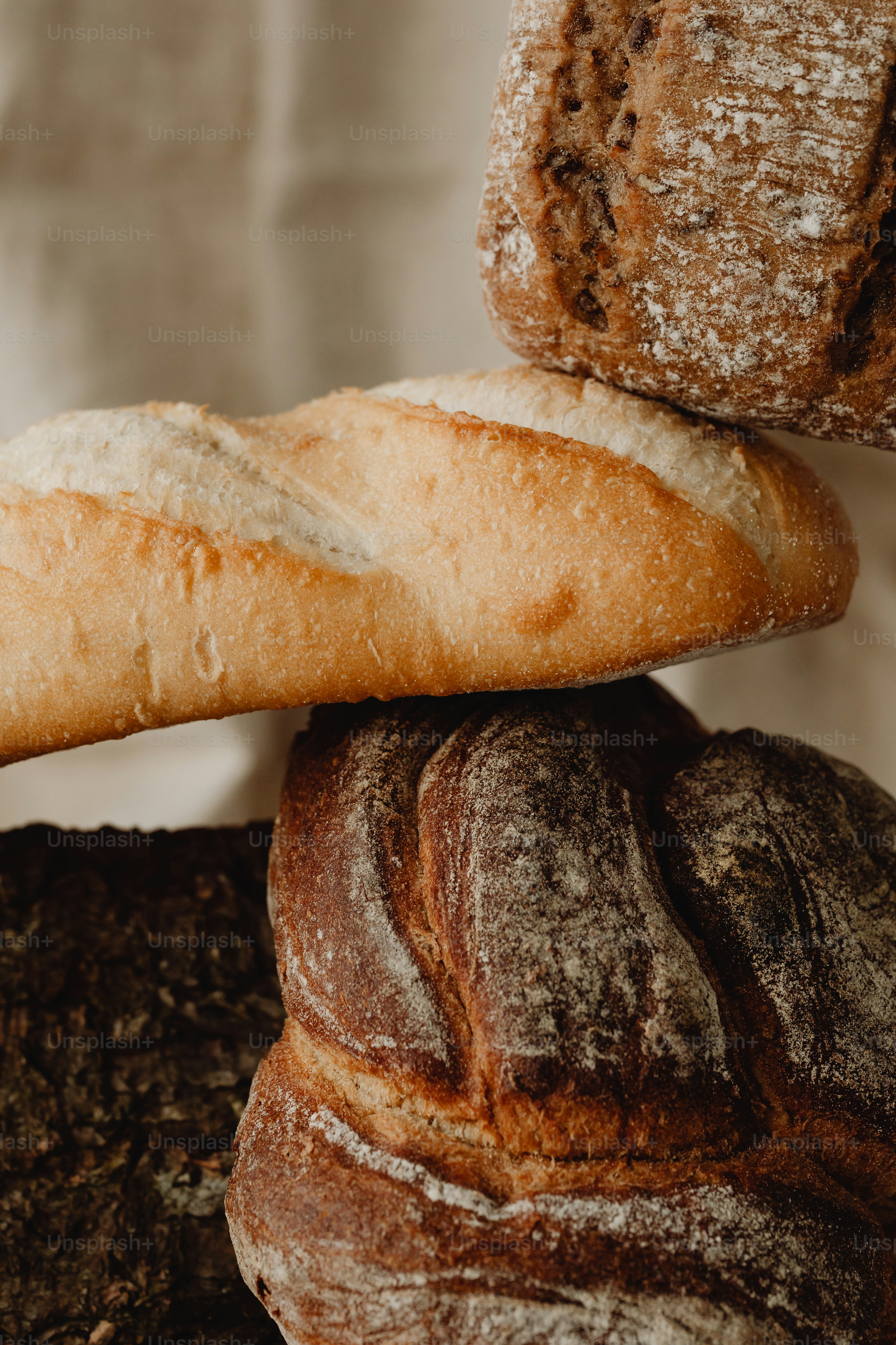 a bunch of breads stacked on top of each other