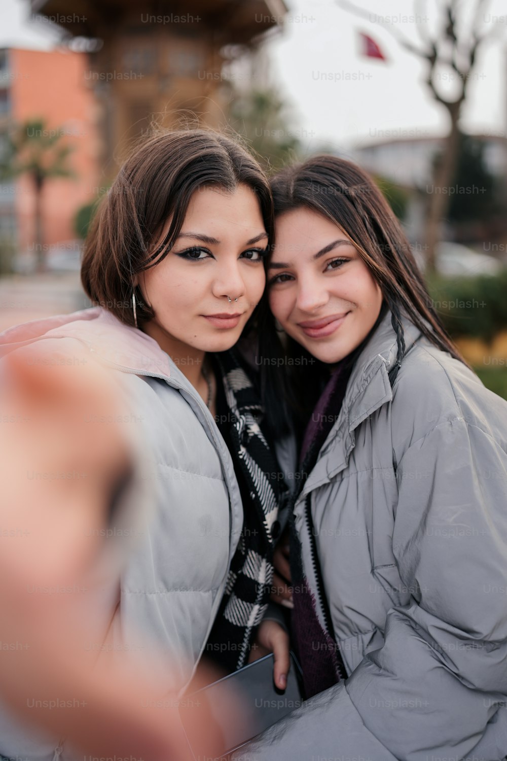 two women are posing for a picture together