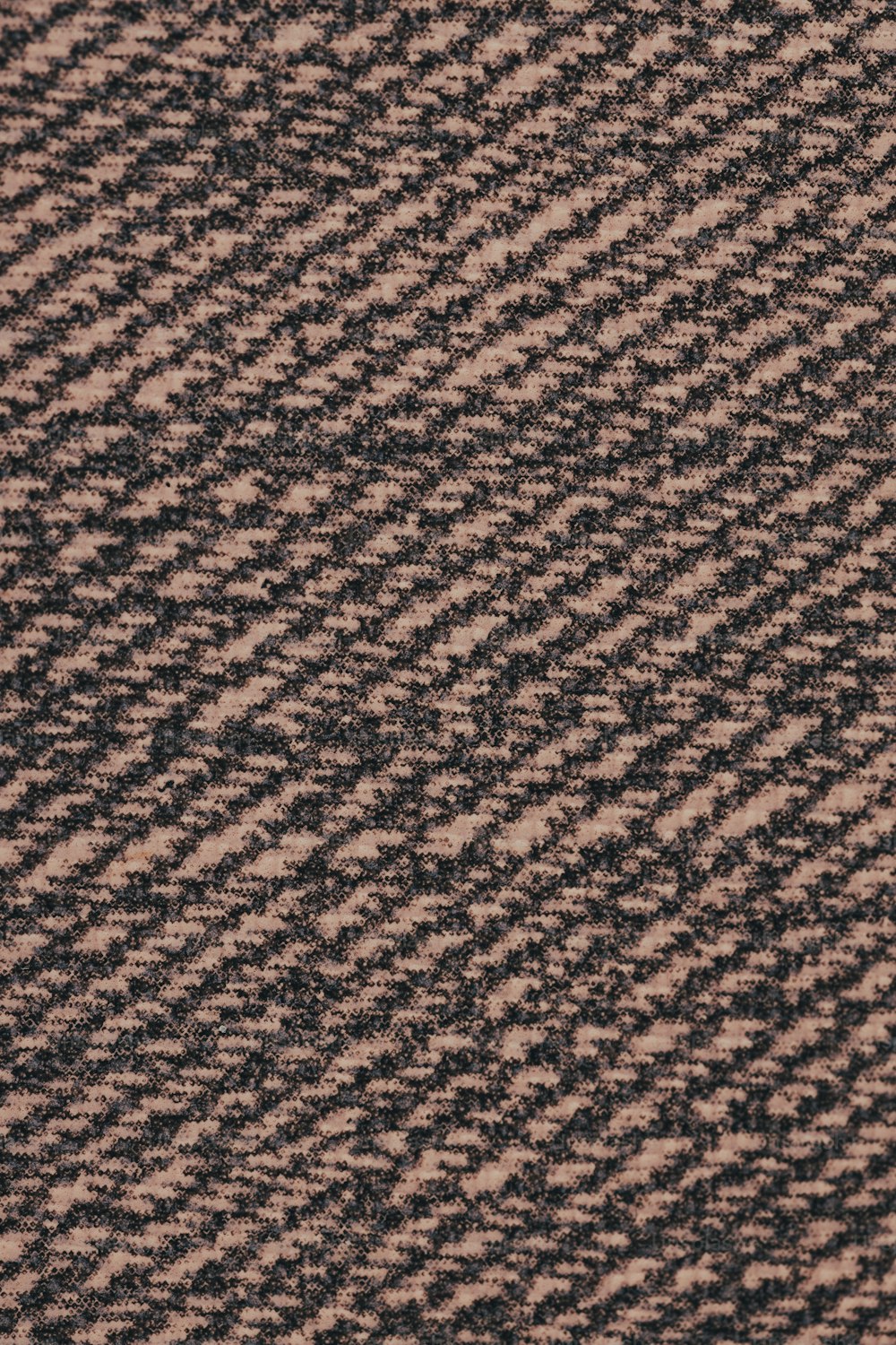 um close up de um tecido de tweed marrom e preto