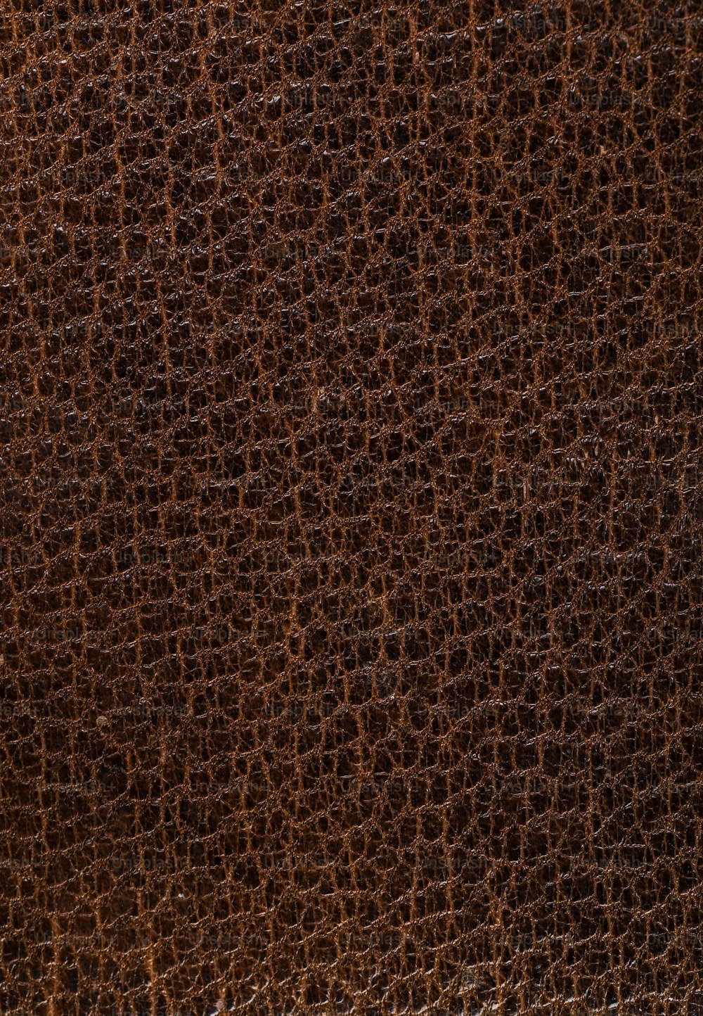 Gros plan d’une texture de cuir brun