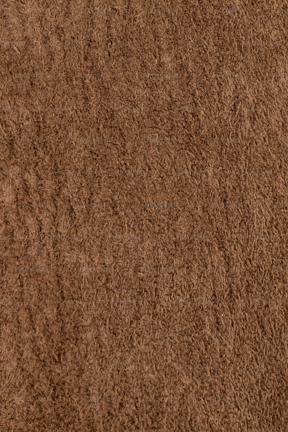 a close up of a brown carpet texture