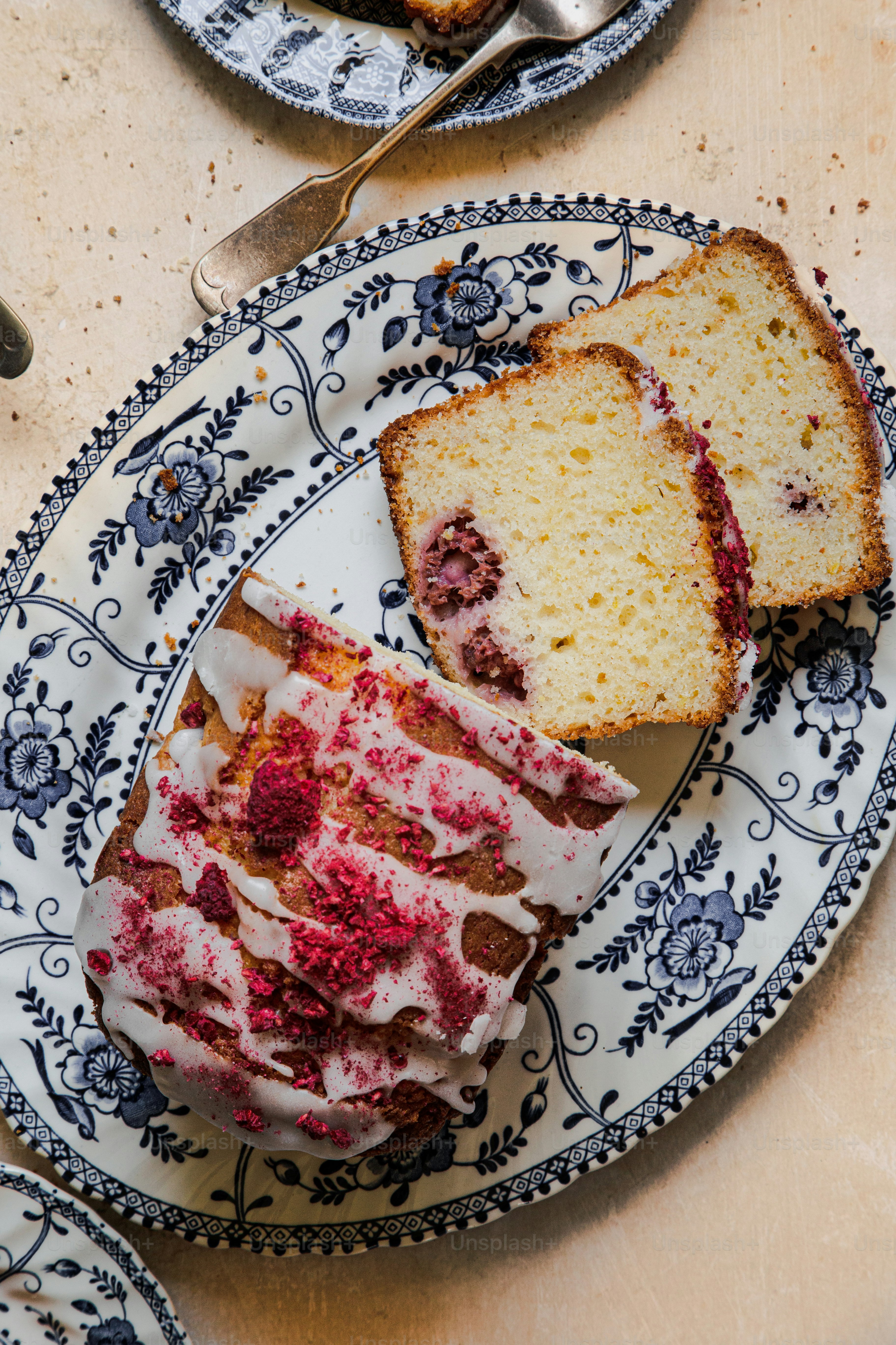 a piece of cake sitting on top of a blue and white plate