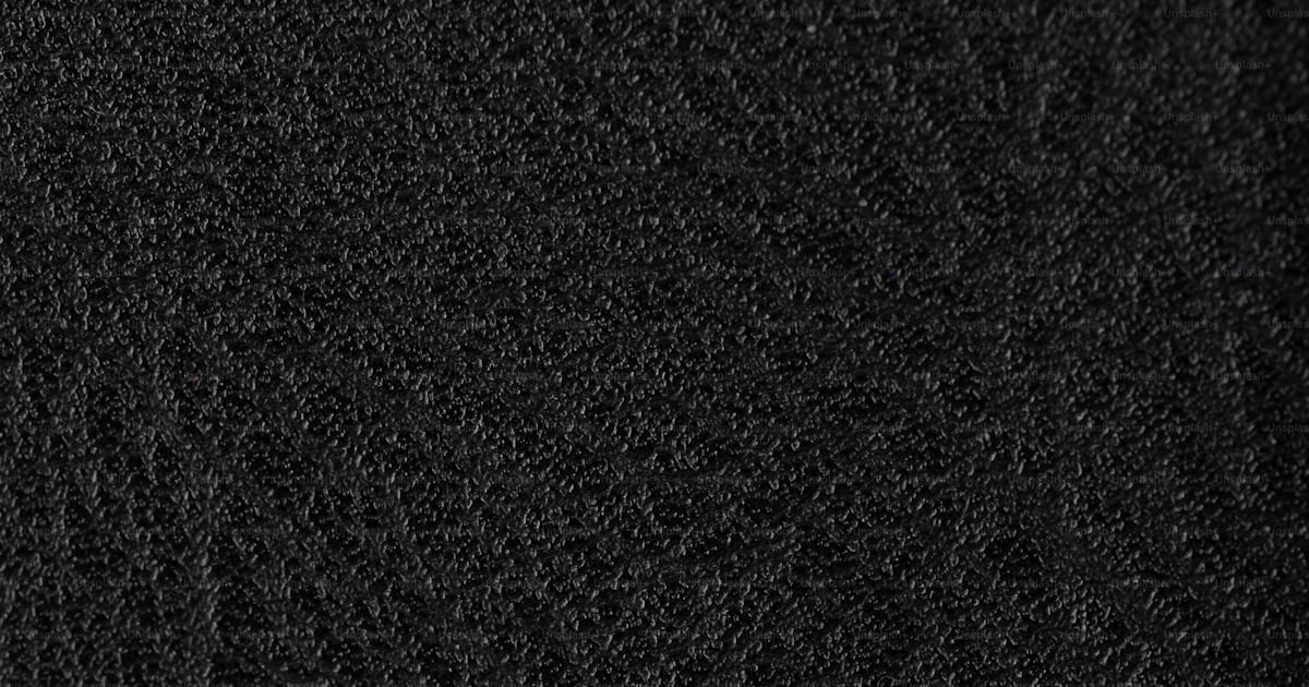 A close up of a black cloth texture photo – Black leather Image on Unsplash