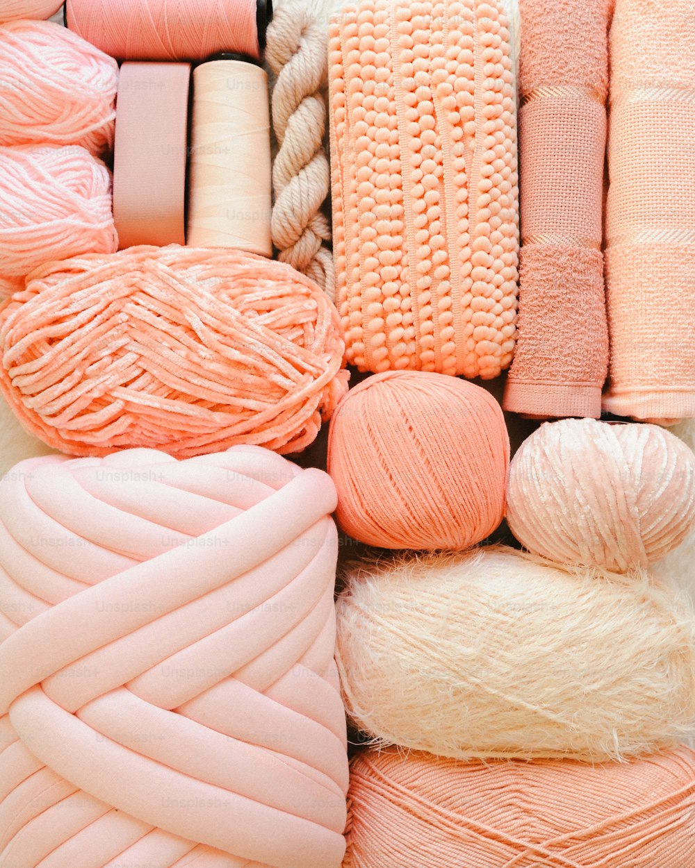 a bunch of yarn that are on a table