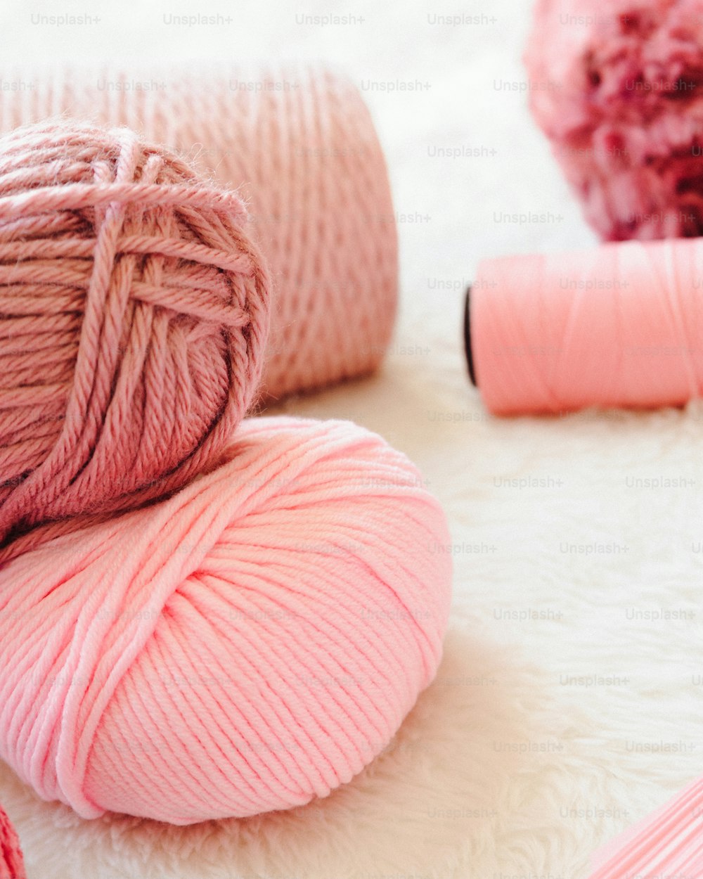 a close up of a ball of yarn and a ball of yarn