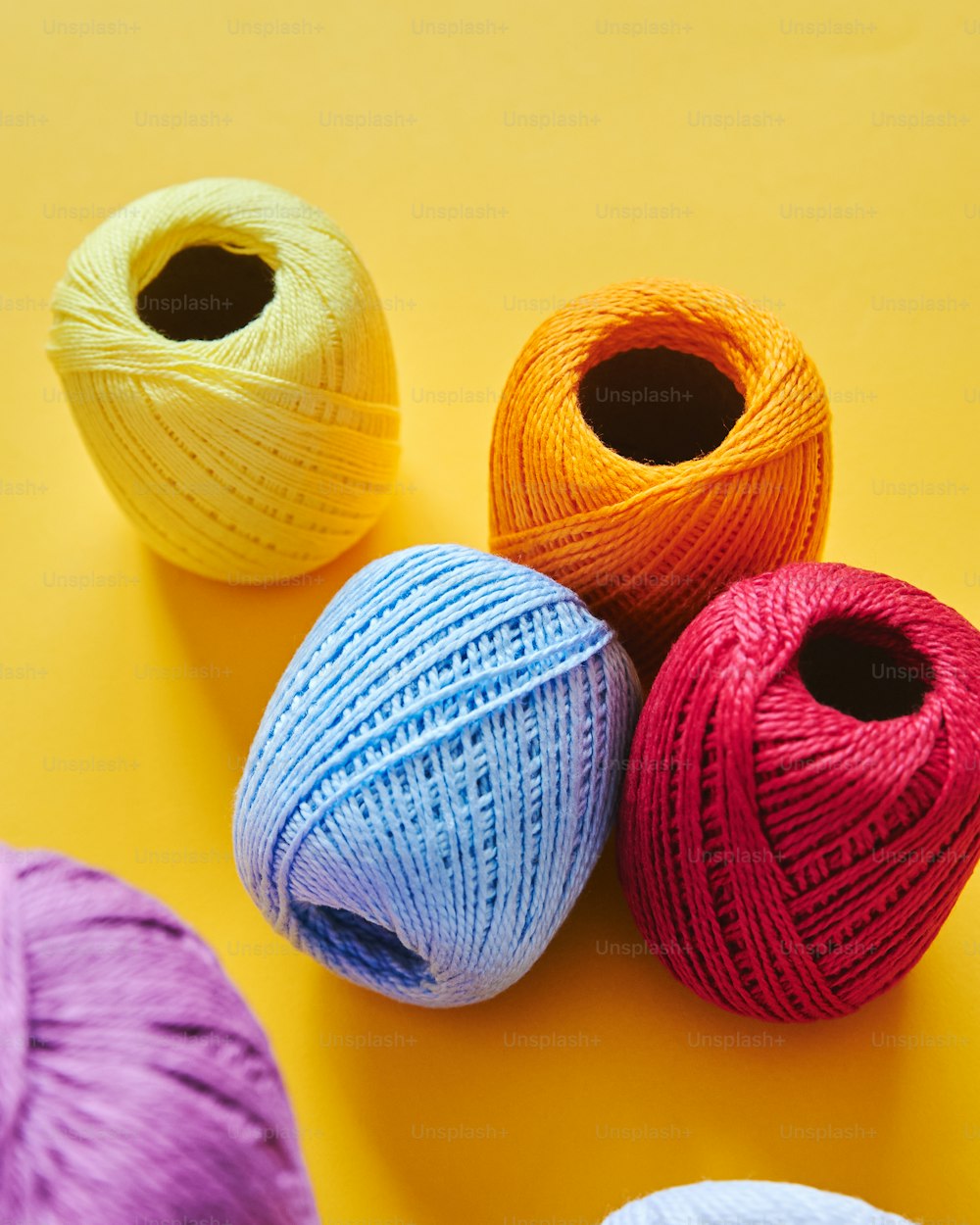 Yarn balls in row Stock Photo by ©ivanmateev 62110323