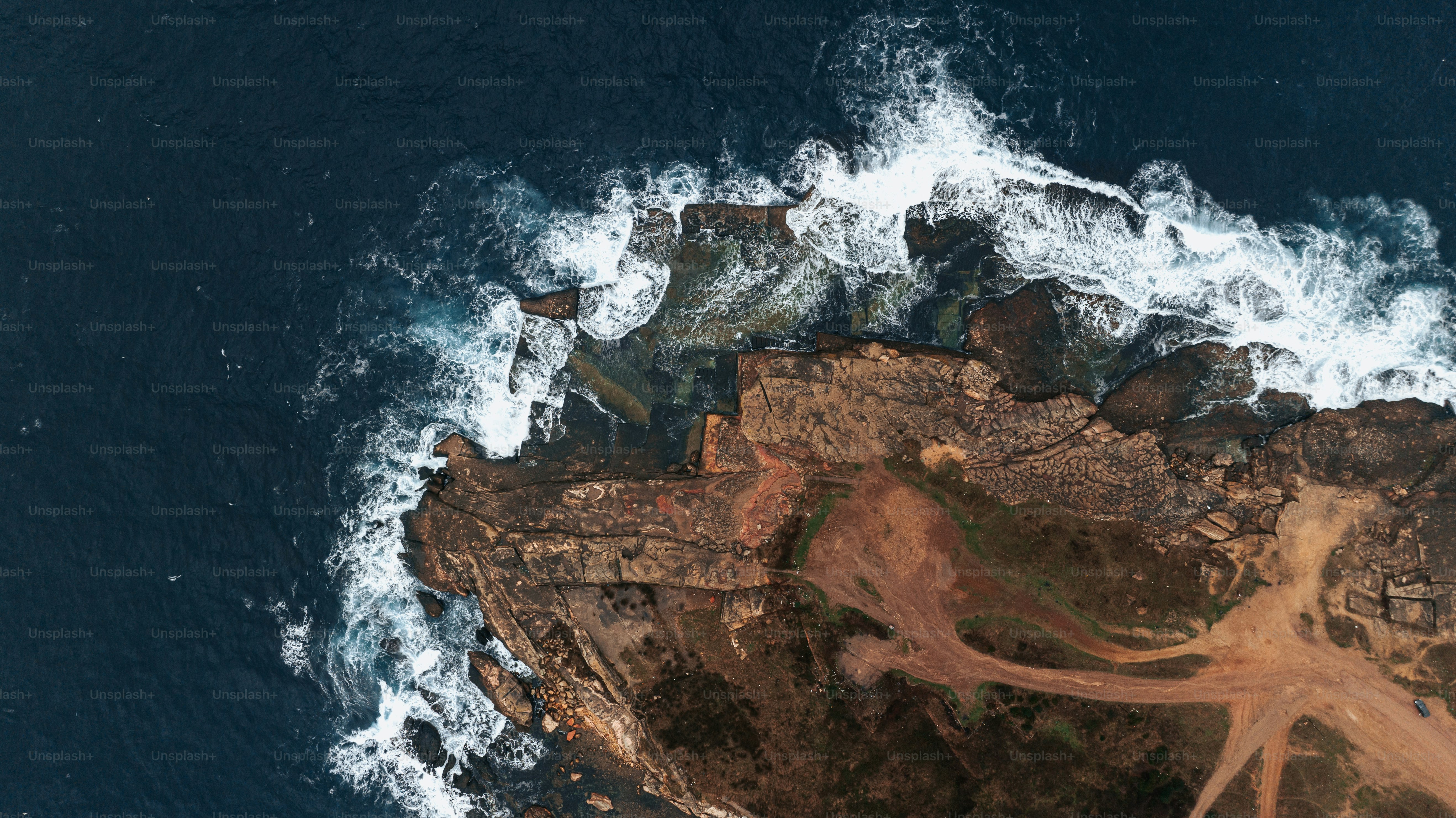 an aerial view of an island in the middle of the ocean