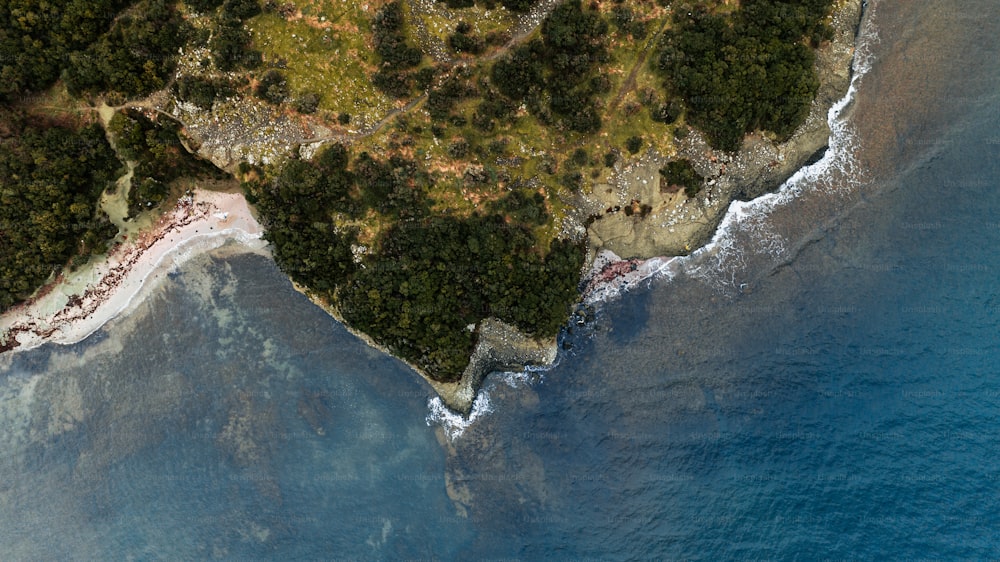 an aerial view of an island in the middle of the ocean