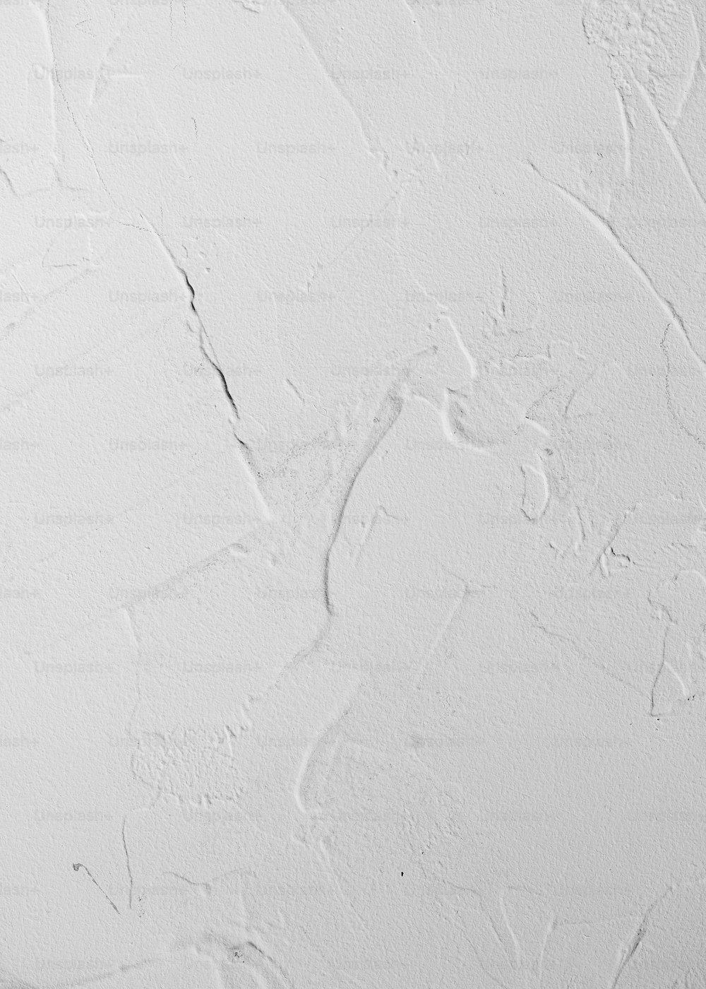a white wall with some white paint on it