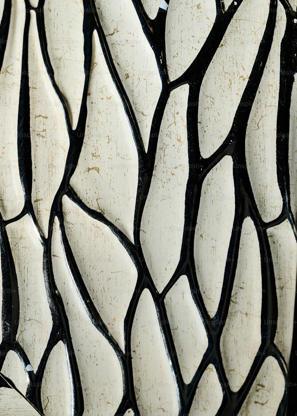 a close up view of a white and black pattern
