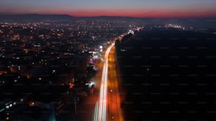 an aerial view of a city at night