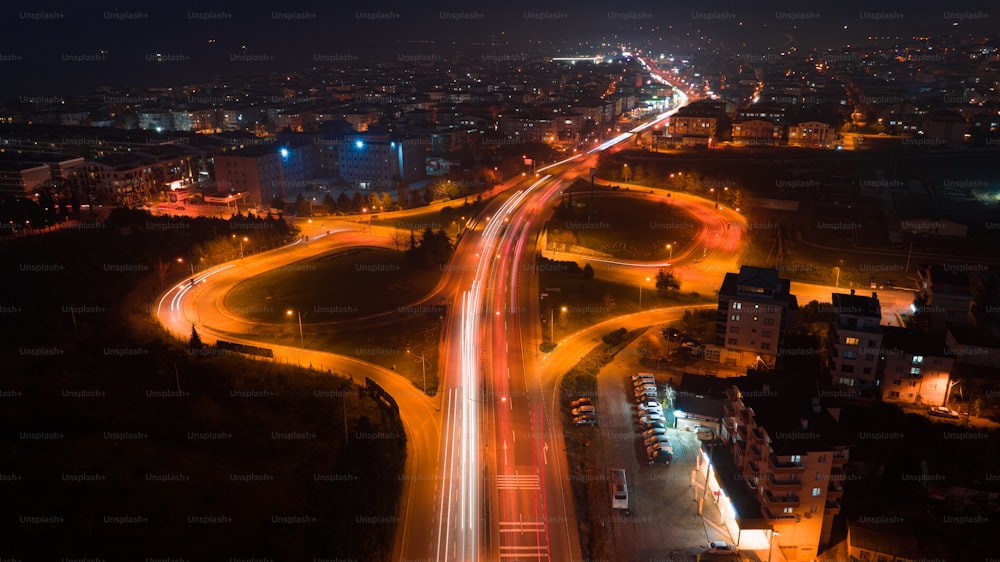 an aerial view of a city at night