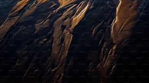 Luftaufnahme eines Sandstrandes bei Sonnenuntergang
