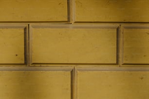黄色いレンガの壁の接写