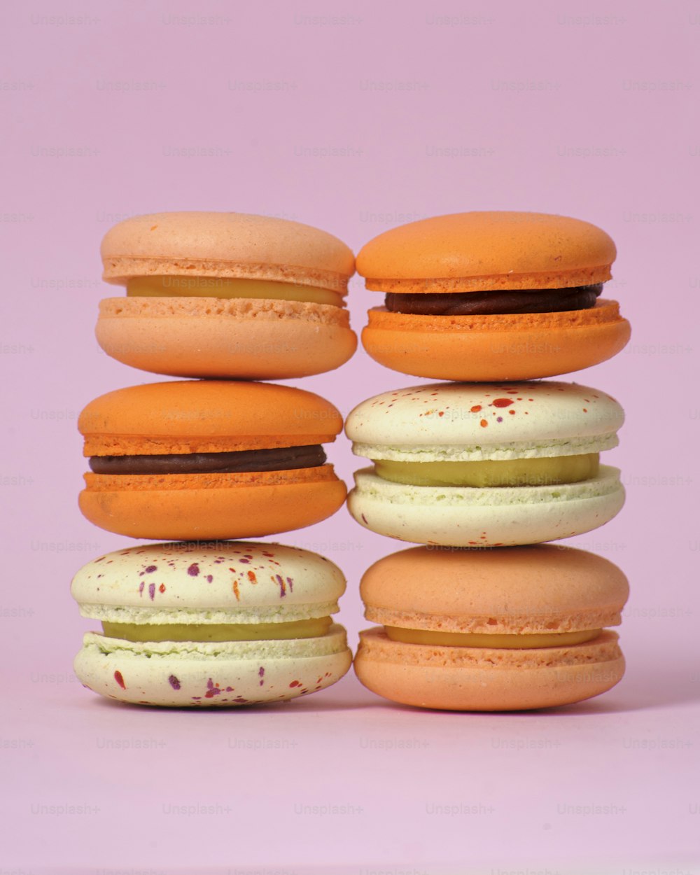 a stack of macaroons sitting on top of each other