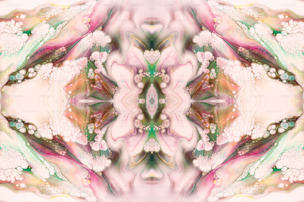 an abstract image of a pink flower with a green center