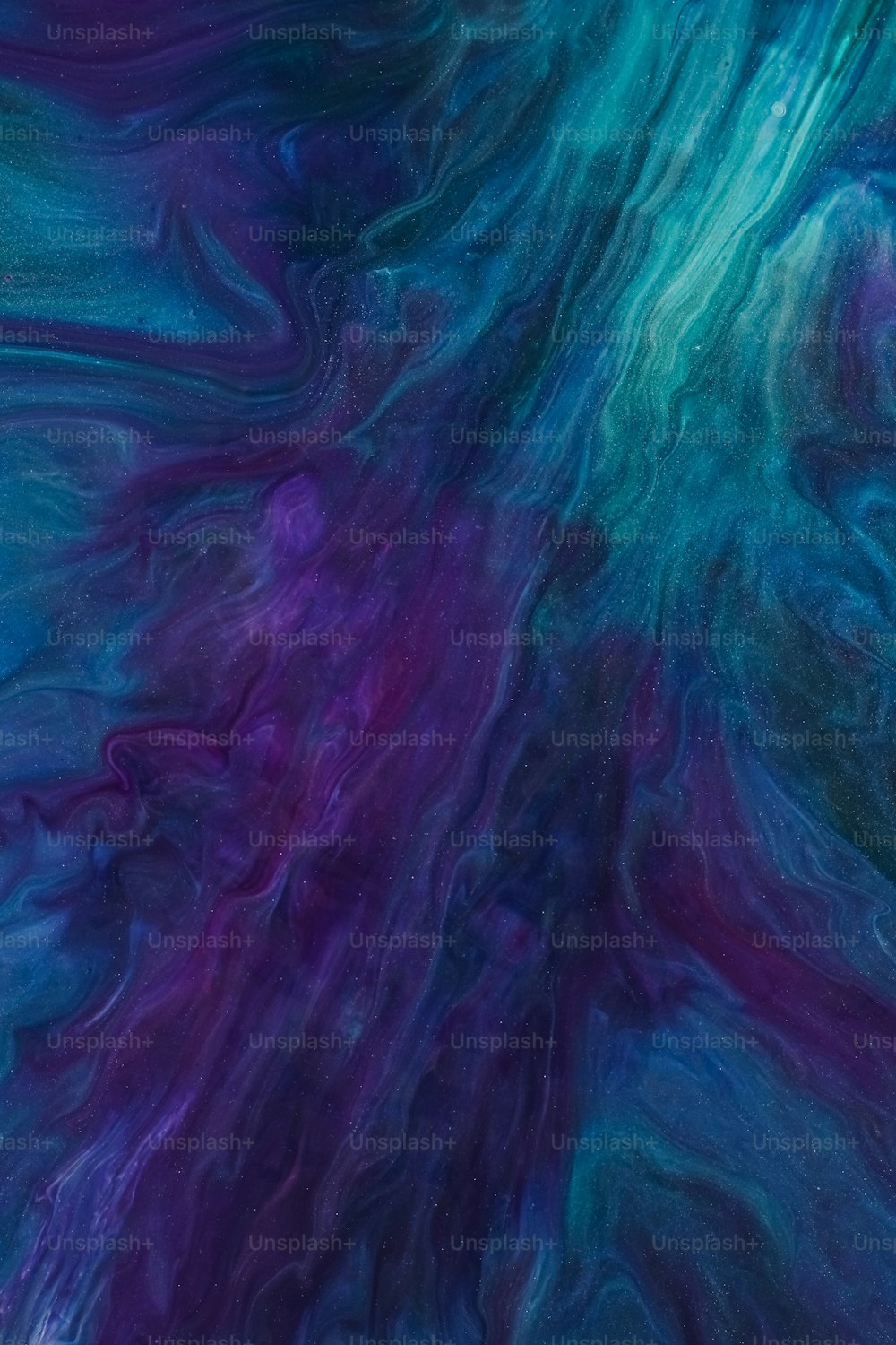 a blue and purple background with swirls