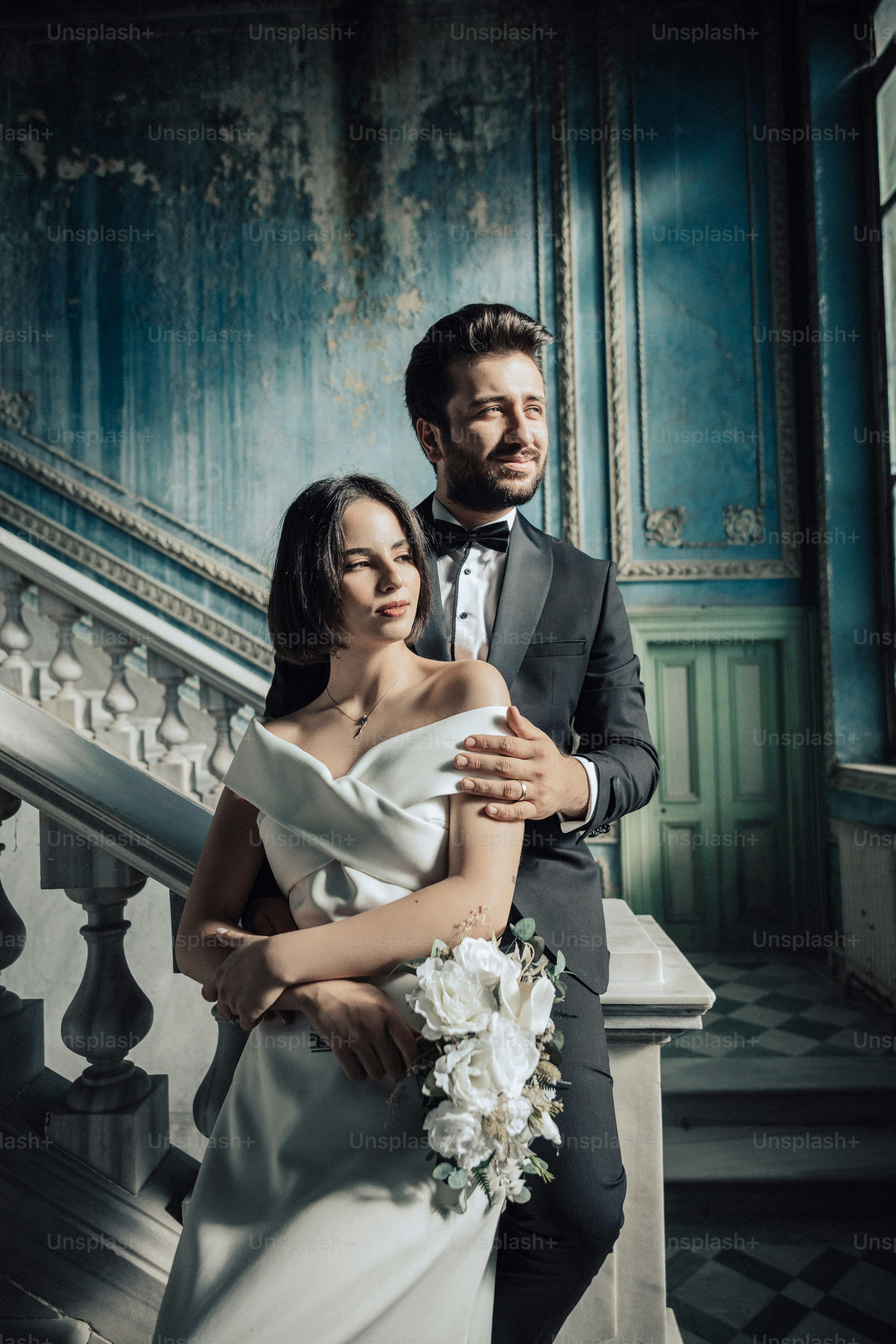 a man and a woman standing next to each other