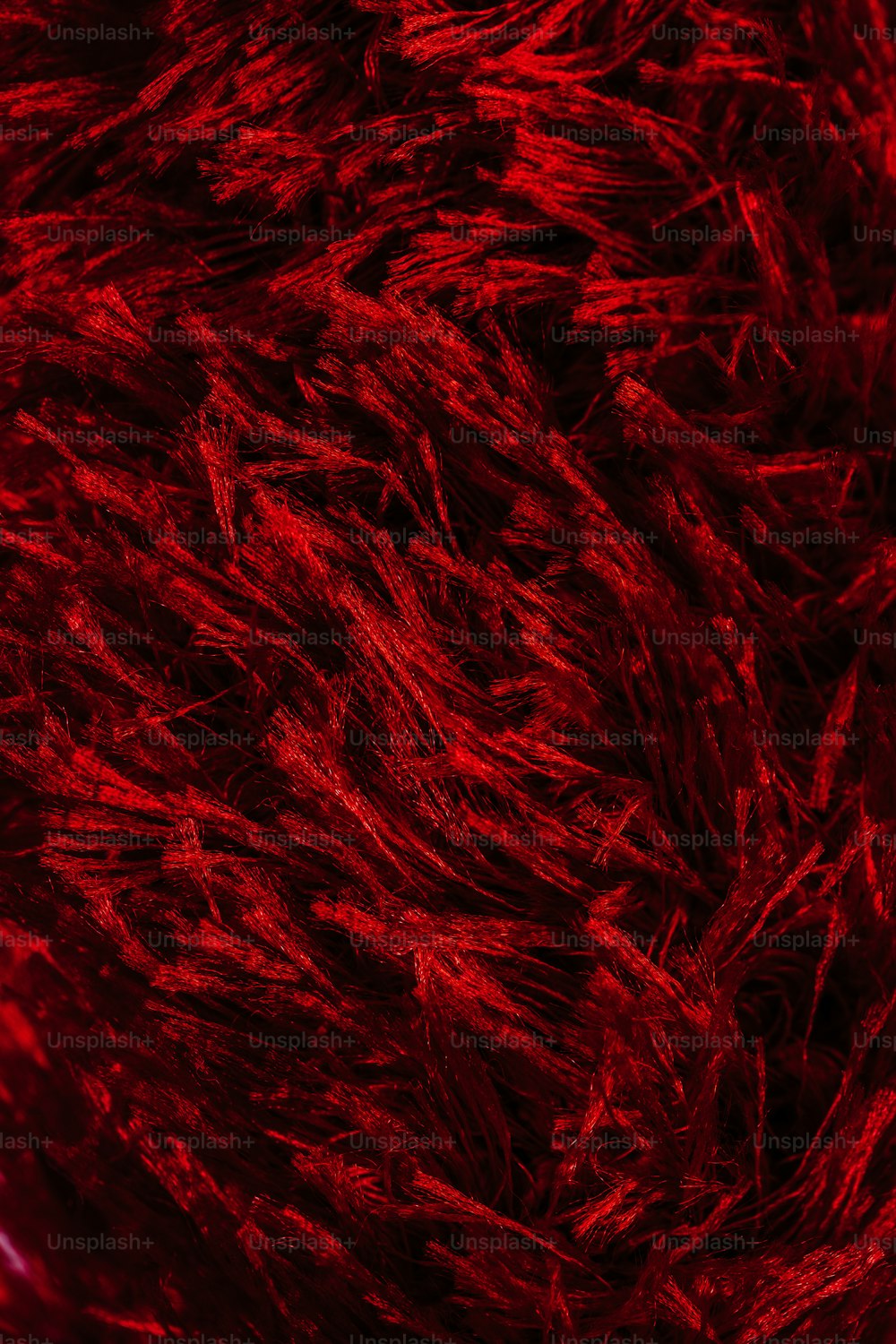 Gros plan d’une texture de fourrure rouge