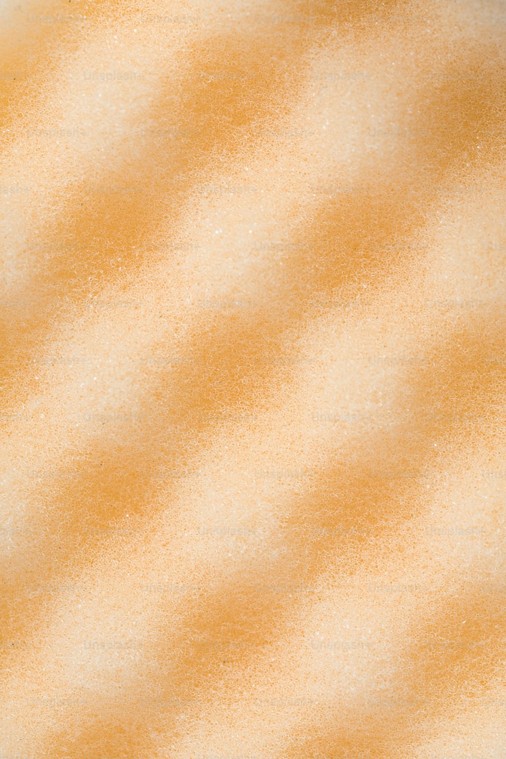 a close up of an orange and white background