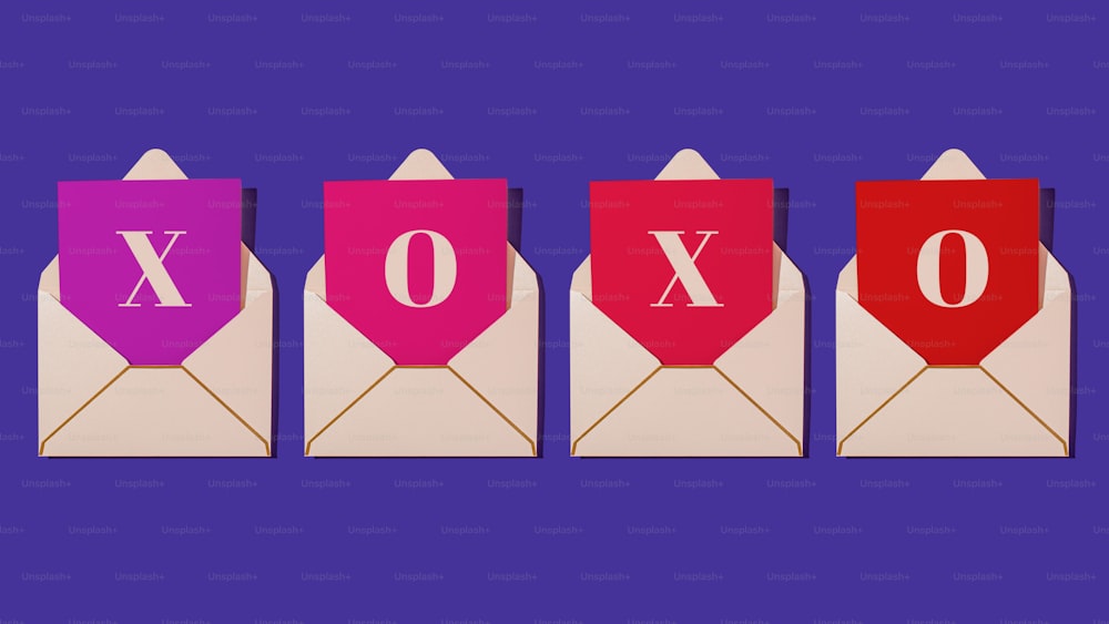 a set of three envelopes with the word xoxo printed on them