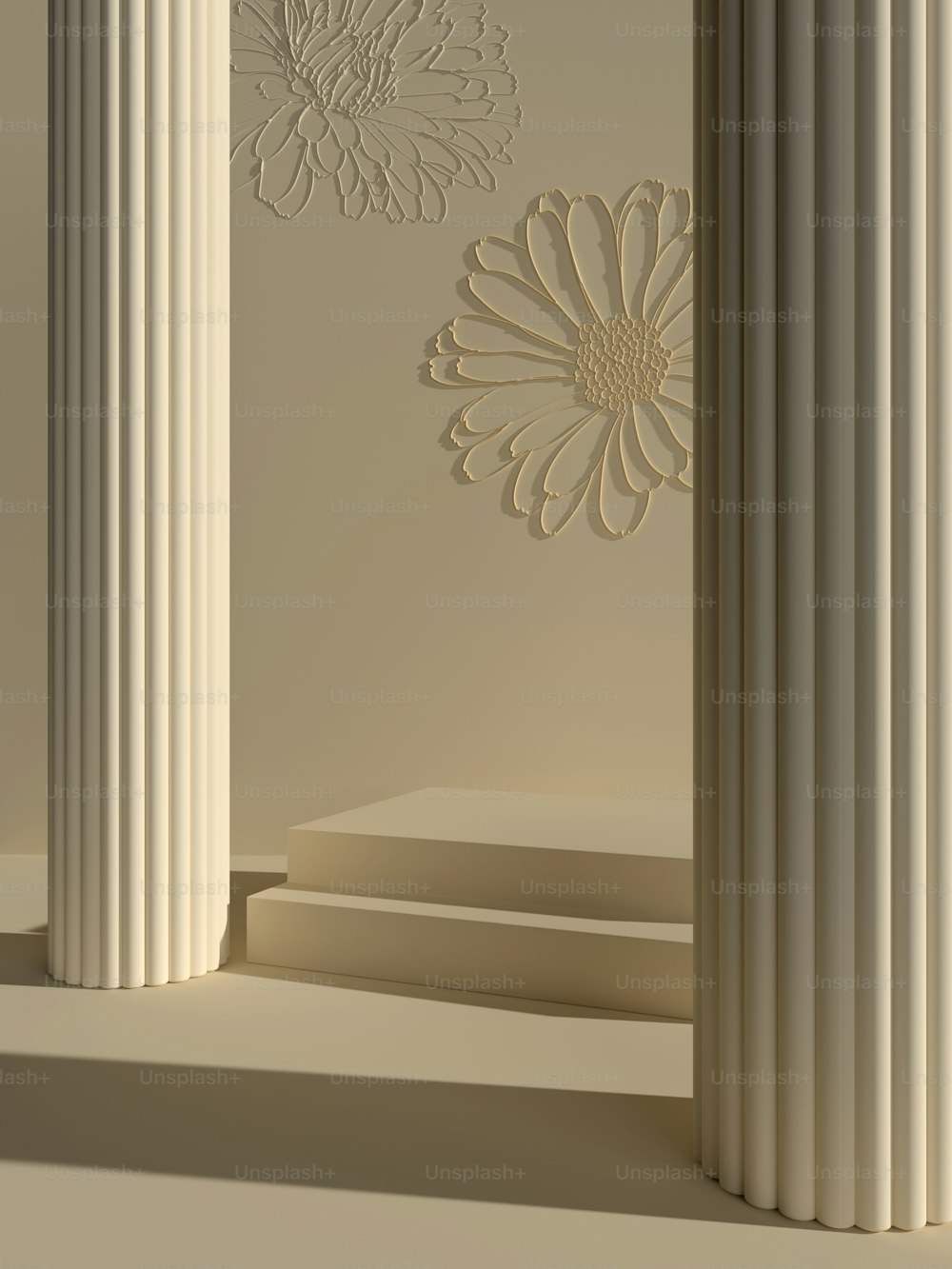 a group of white pillars with a flower on the wall