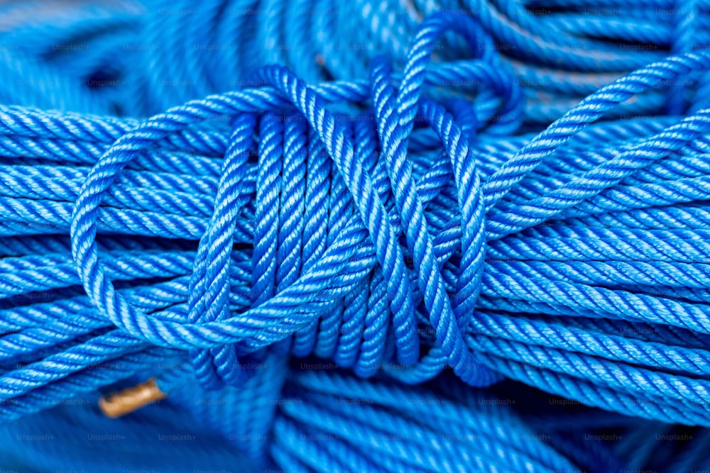 a close up of a rope of blue color