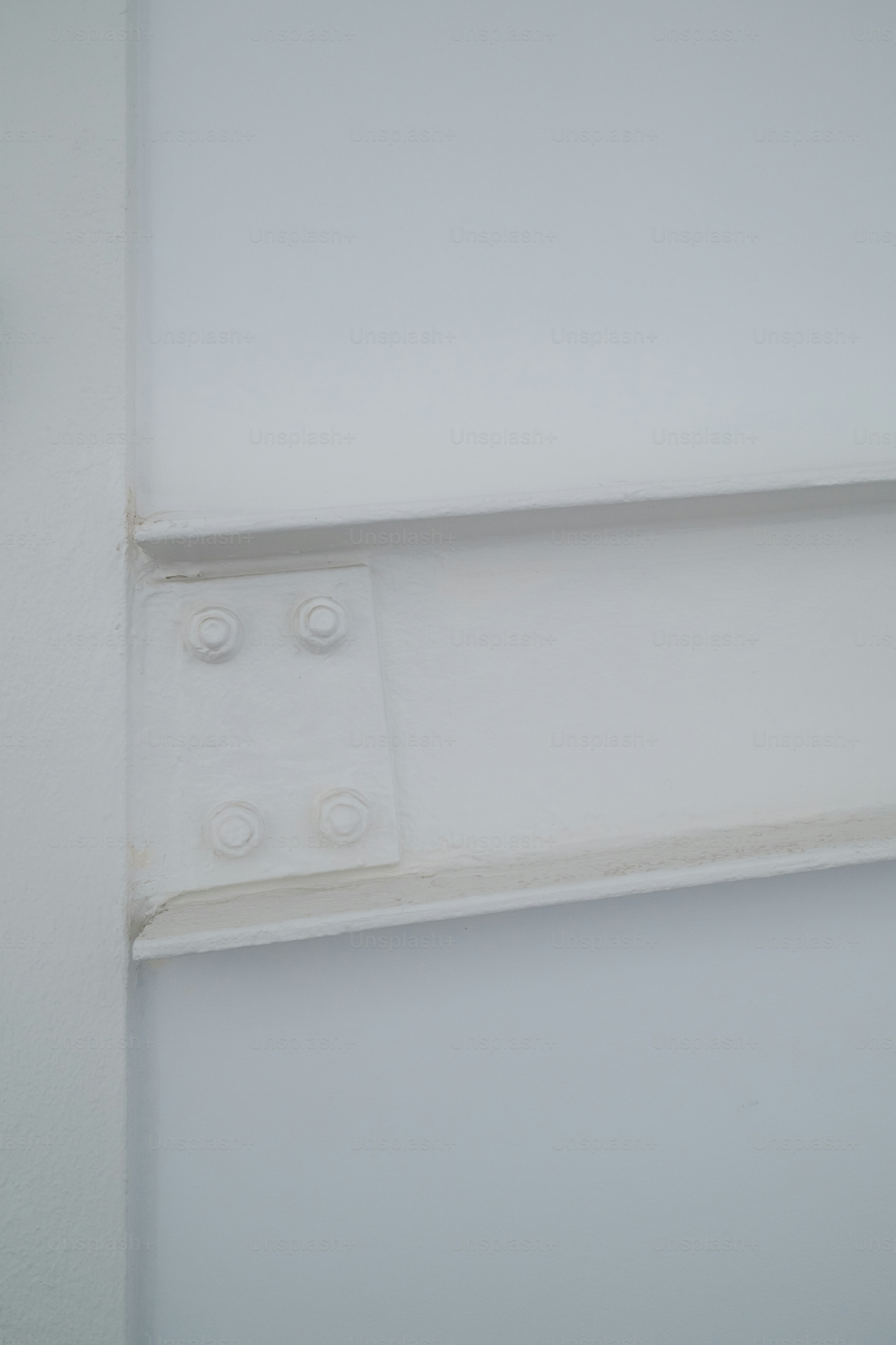 a close up of a light switch on a wall