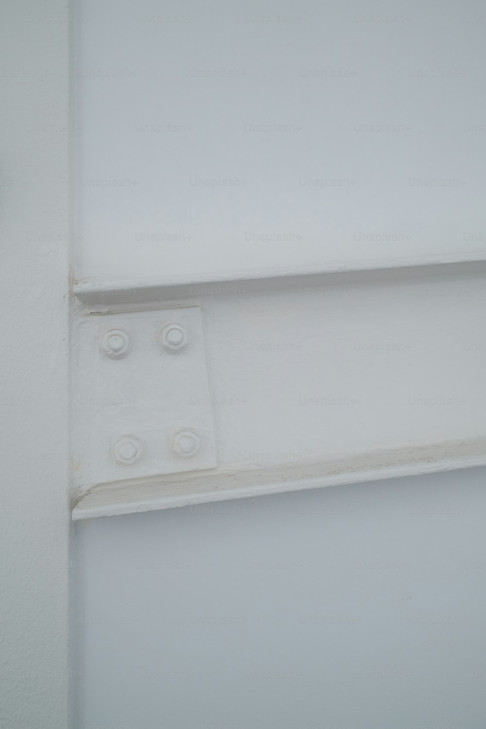 a close up of a light switch on a wall