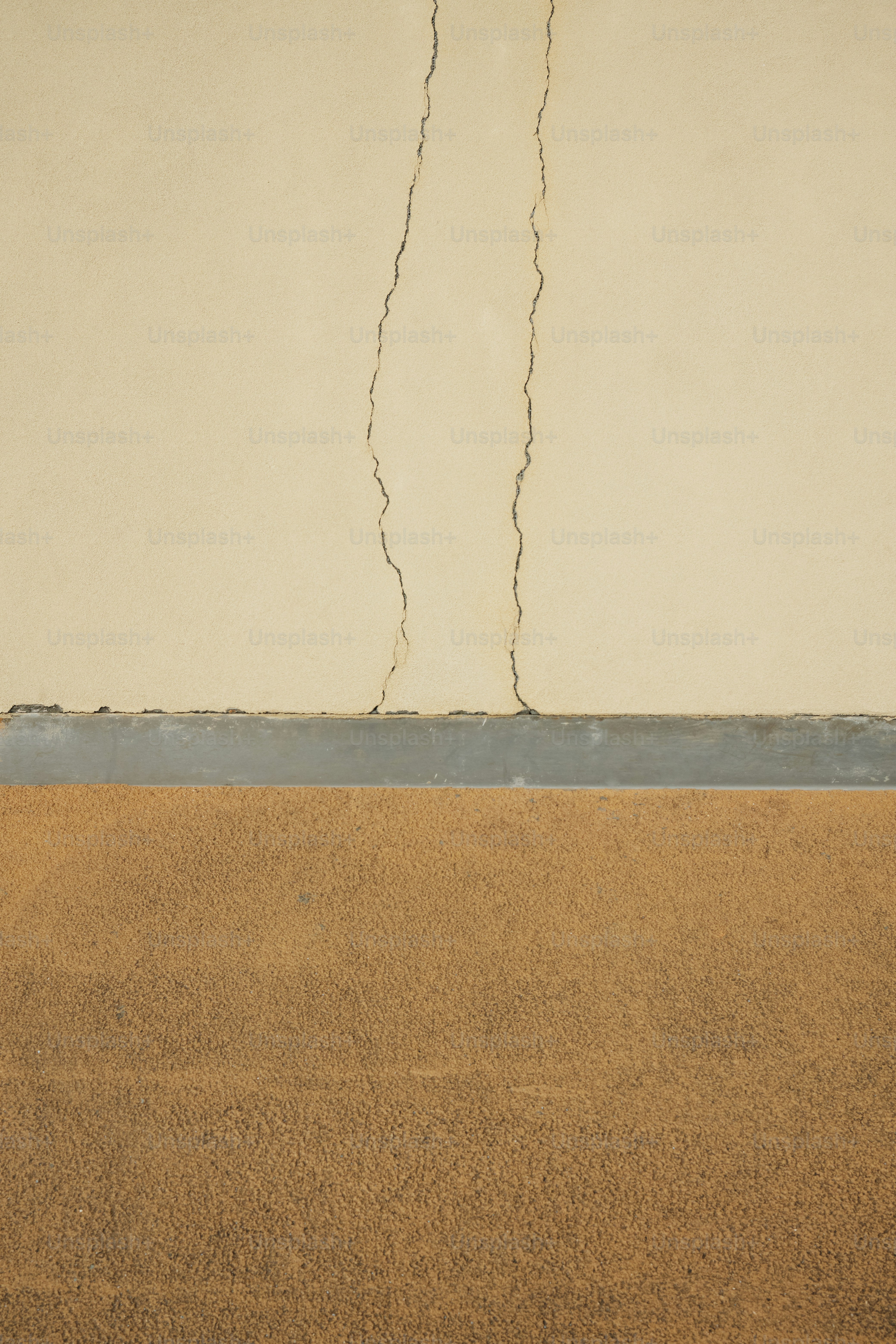 a white wall with a crack in it