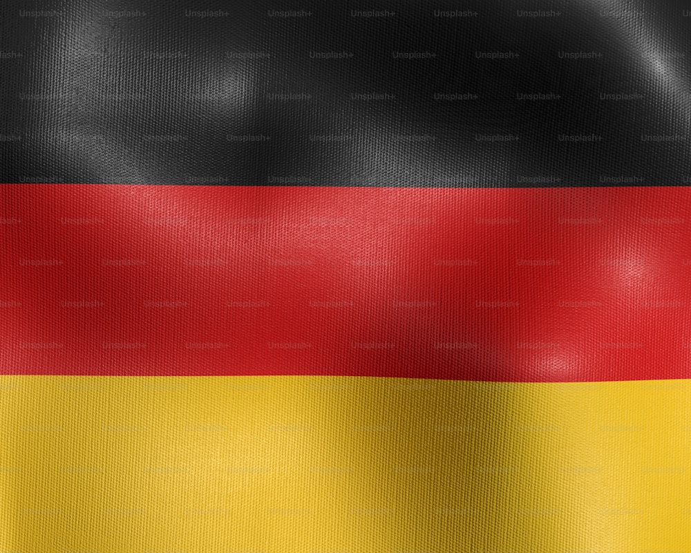 the flag of germany is waving in the wind