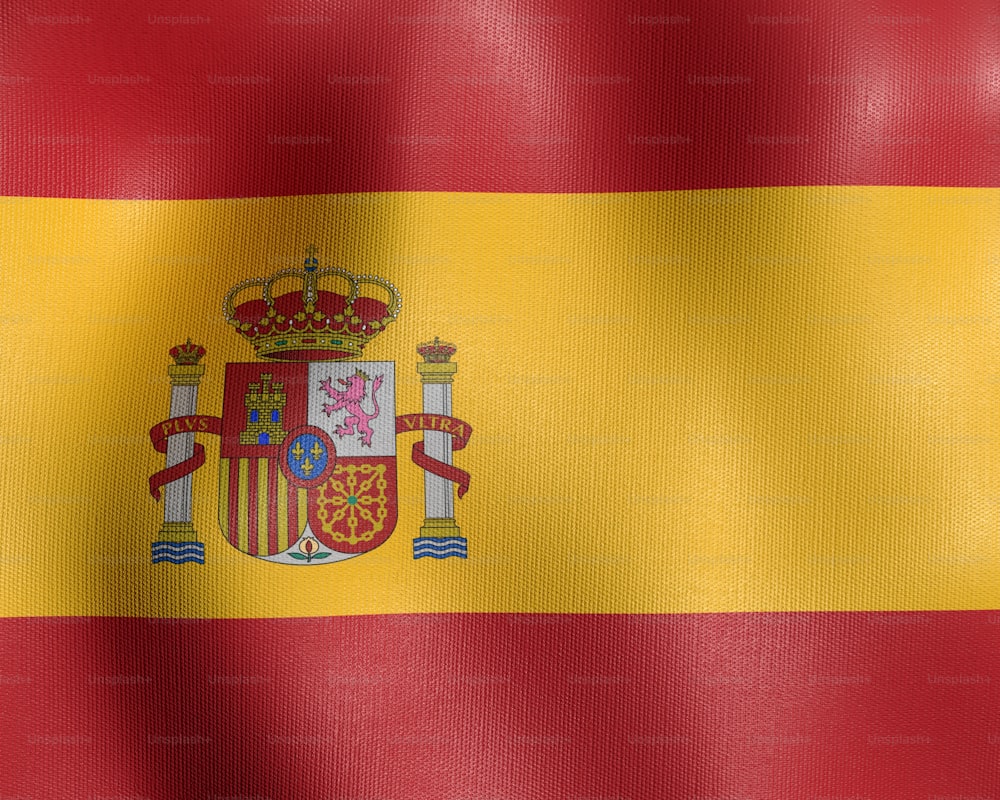 the flag of spain waving in the wind