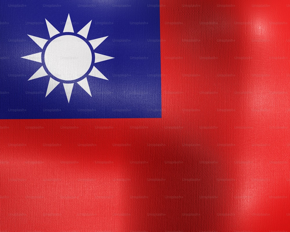 a red and blue flag with a white sun on it