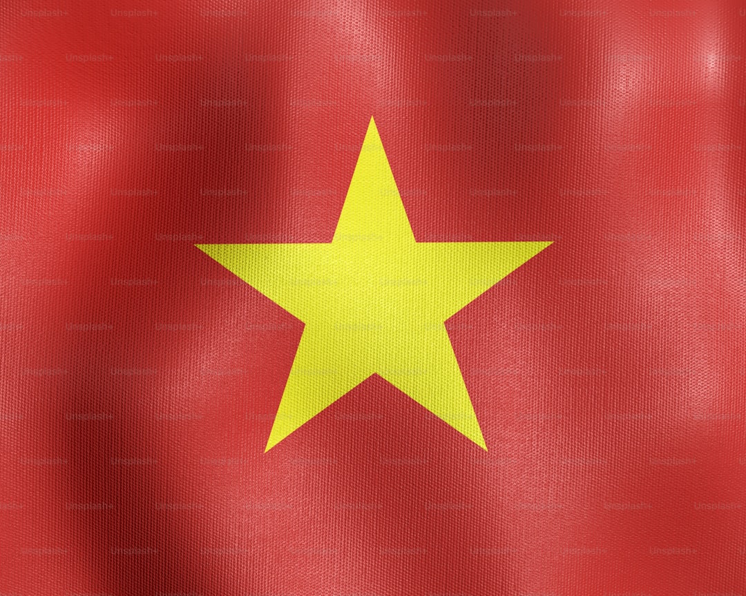 the flag of vietnam is waving in the wind