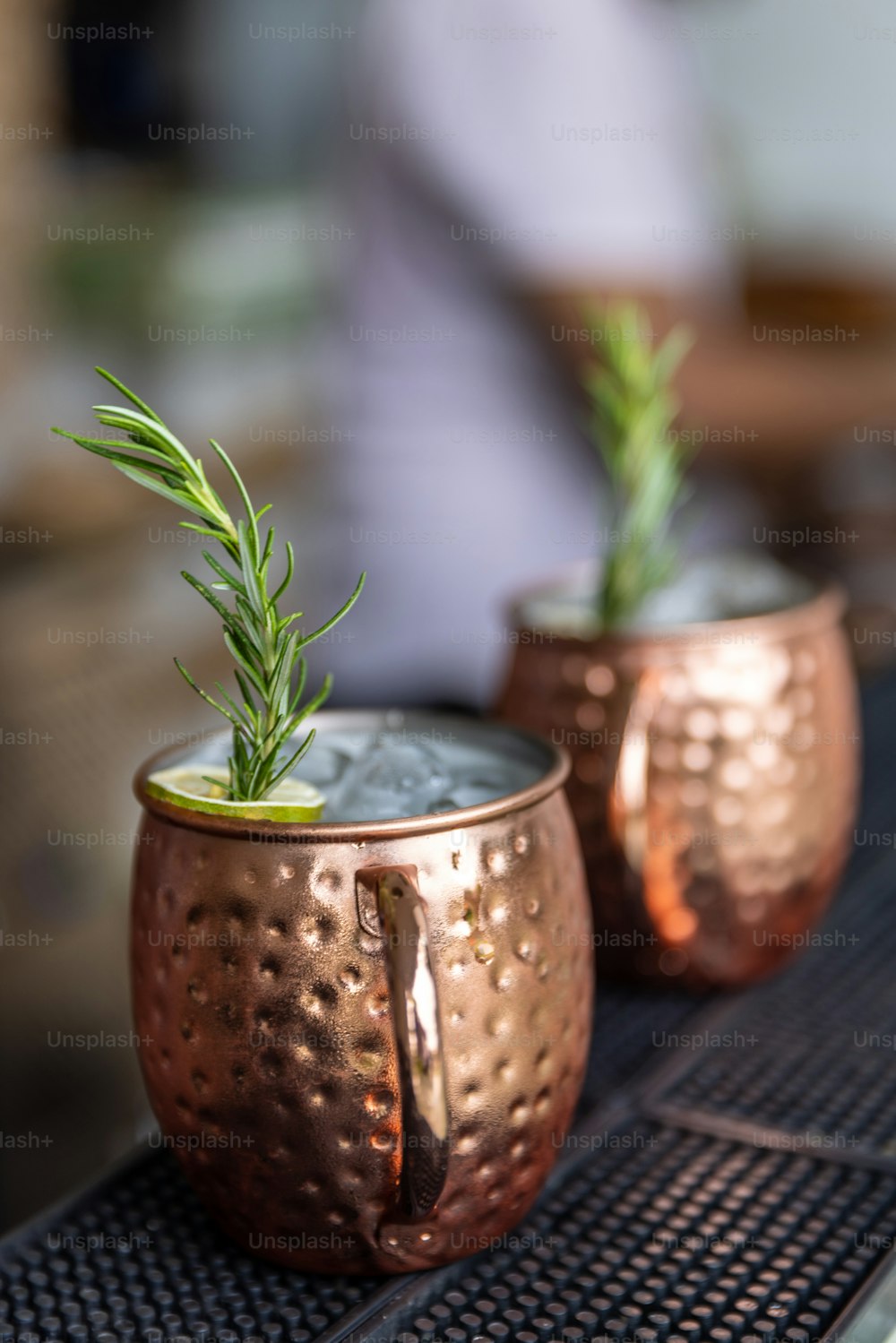 a couple of cups that are sitting on a table