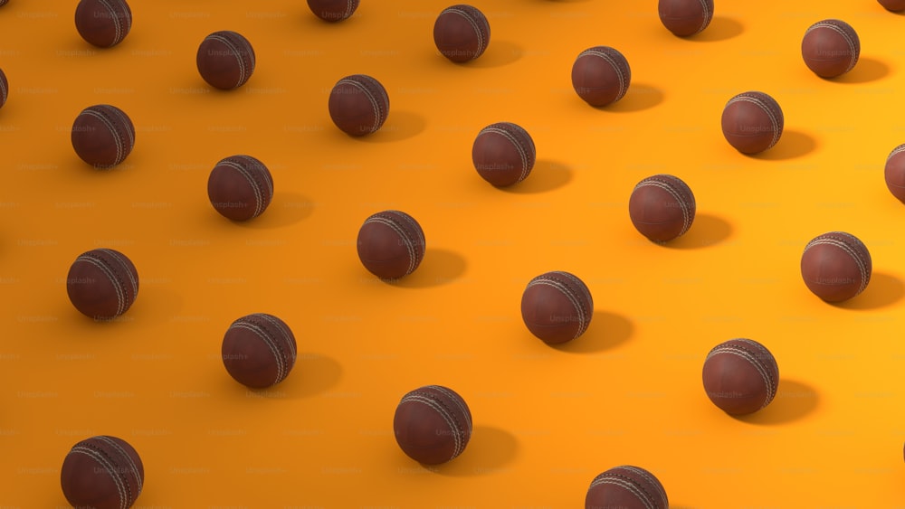 a bunch of balls that are on a yellow surface