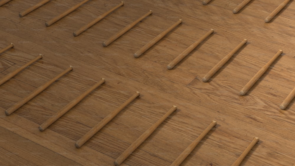 un gros plan d’un plancher en bois avec des clous dessus