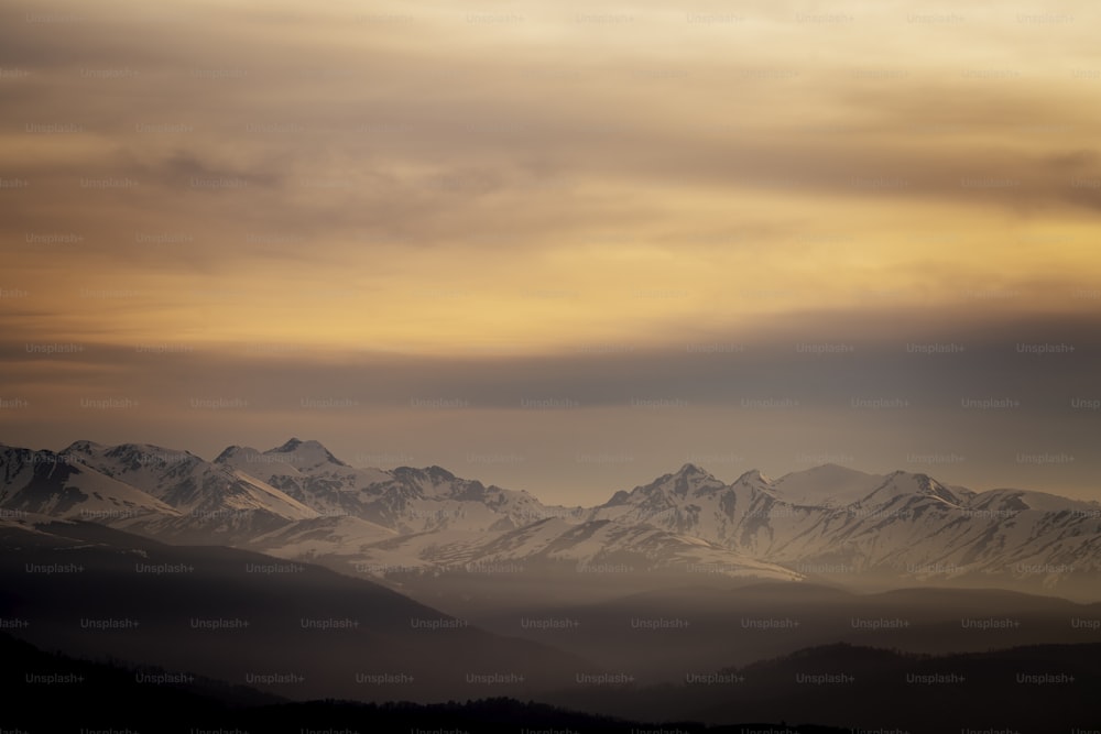 a view of a mountain range from a distance