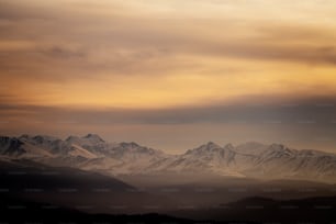 a view of a mountain range from a distance