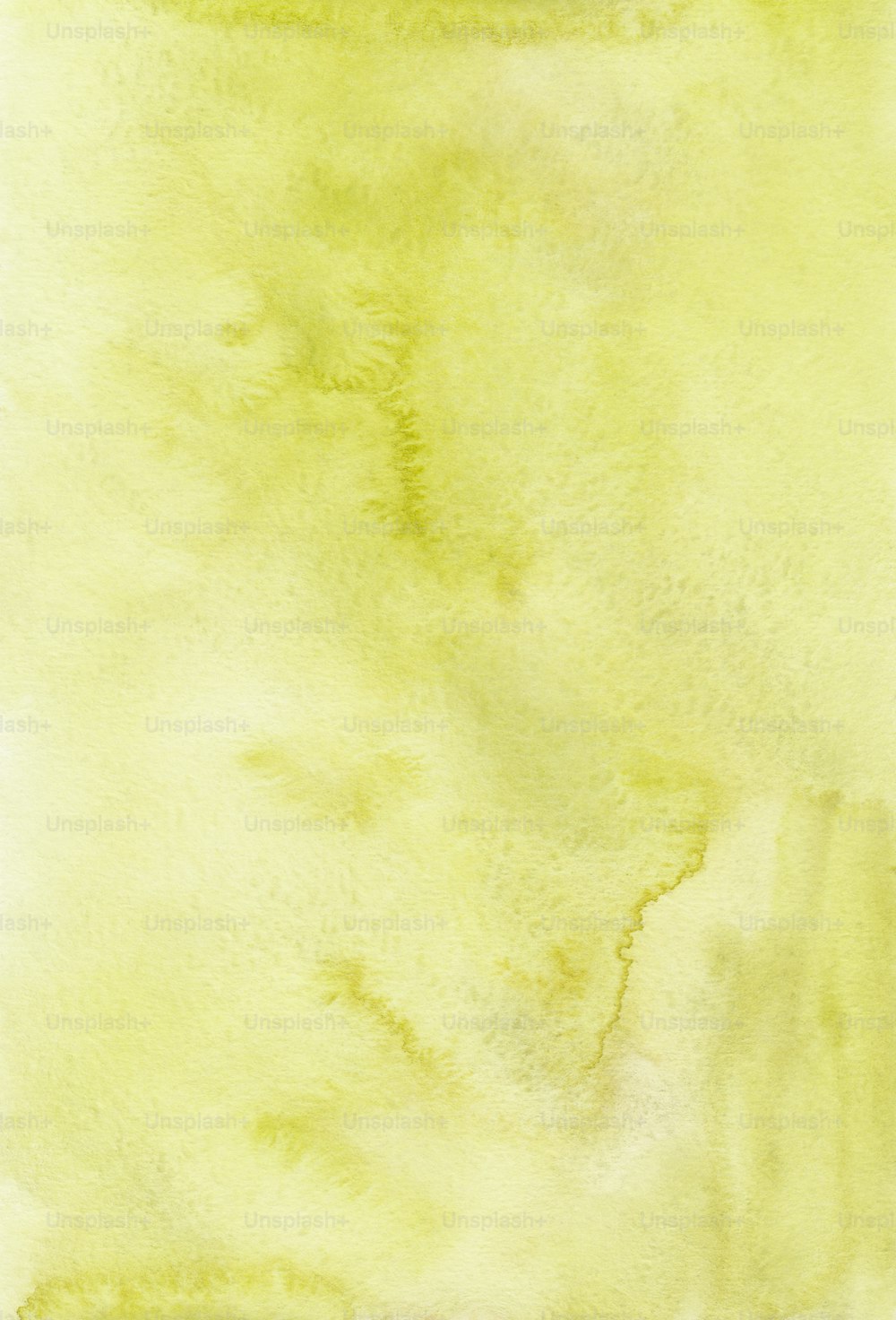 a watercolor painting of a yellow background