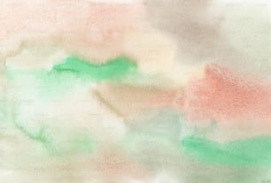 a blurry image of a green, pink, and white background