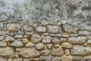 a stone wall with rocks on it