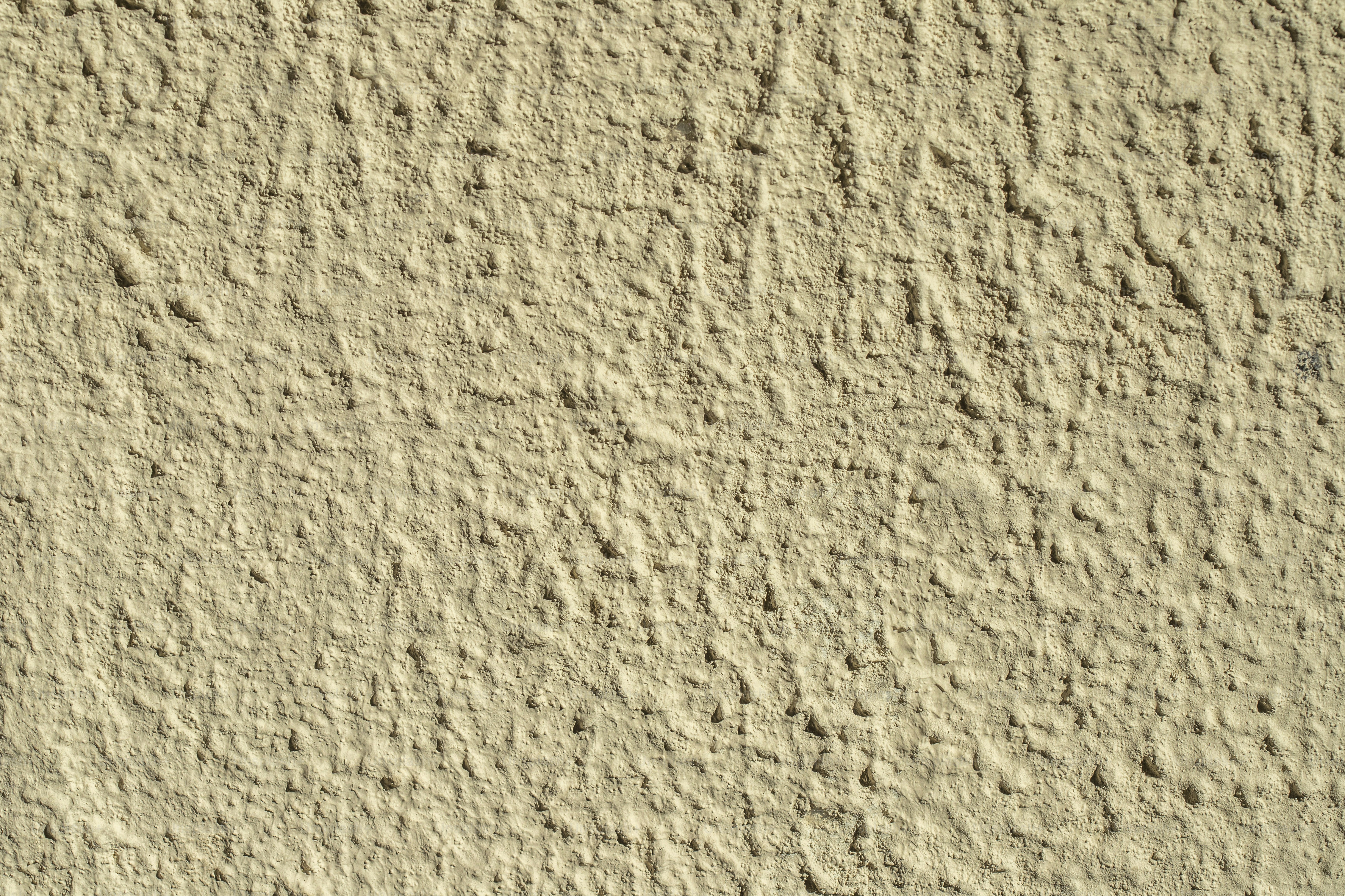 close-up dinding yang terbuat dari pasir