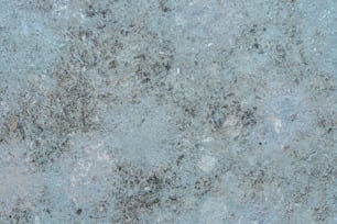 a close up of a blue granite surface