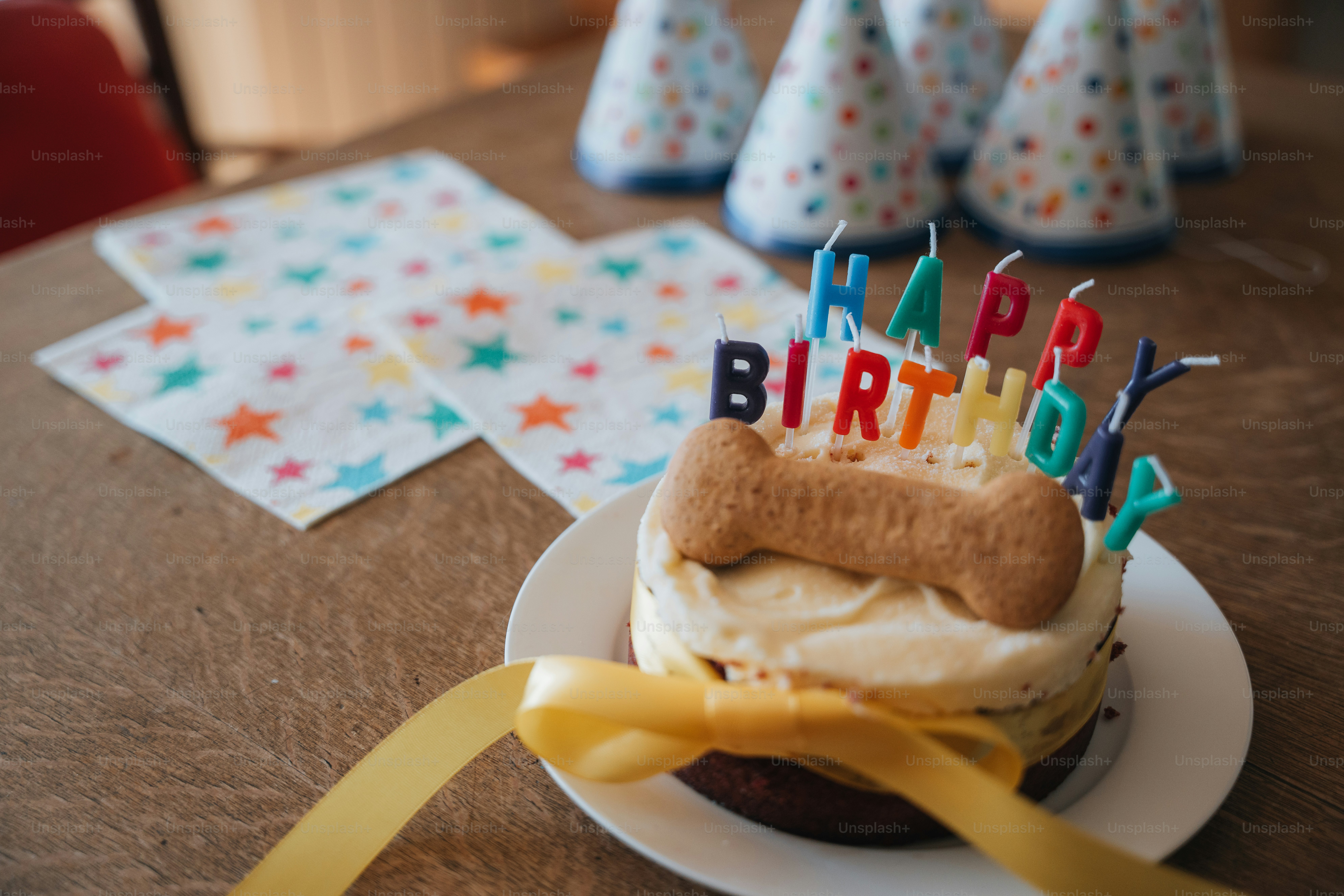 a birthday cake sitting on top of a white plate